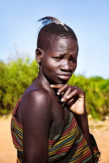 Photo art by Victoria Knobloch: scene of the Karamojong tribe in Uganda