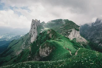 Photo art by Ueli Frischknecht: green hills in the Alpstein under a blue sky