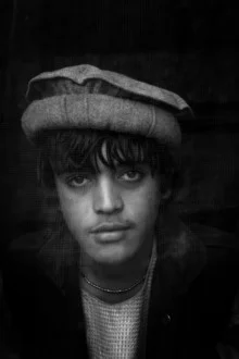 Wall art by Rada Akbar: portrait of a refugee boy in Kabul