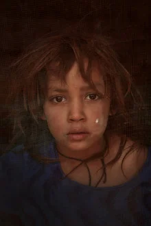 Photo art by Rada Akbar: Portrait of an Afghan man with a calm expression.