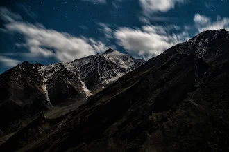 Night view of mountains under a sparkling starry sky in India