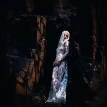 Photo art by Rova Fineart - Simone Betz: Woman stands bravely among rocks in nature.