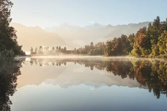 Photo art by Manuel Gros: peaceful reflection of Lake Matheson at sunrise.