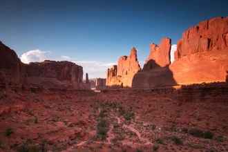 Photo art by Christoph Schaarschmidt: warm sunset colors over rock formations