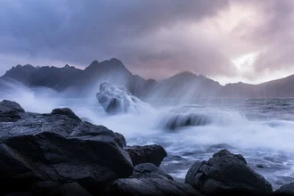 Photo art by Sebastian Worm: gentle waves breaking on the coast of Norway.