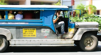 Photo art of a jeepney ride in the Philippines, capturing vibrant everyday life.