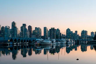 Photo art by Manuel Gros: City lights and boats in Vancouver harbor at sunset