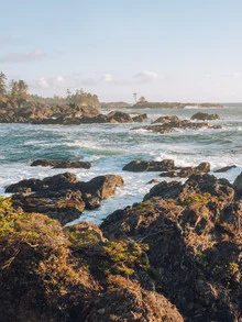 Photo by Manuel Gros: serene coastal landscape with cliffs and waves at sunset