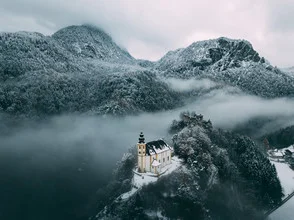 Photo art by Sebastian ‚zeppaio' Scheichl: winter chapel on a hill with clouds
