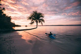 Photo art by Sebastian ‚zeppaio' Scheichl: paddling at sunset in Indonesia.