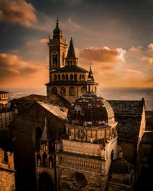 Photo art by Vincenzo Romano: sunset over Bergamo Alta with soft colors