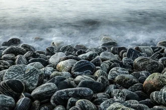 Photo art by Sebastian Worm: Stones at the Norwegian coast with gentle waves