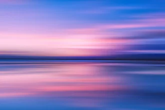 Abstract photo art featuring warm colors and gentle water movements at sunset.