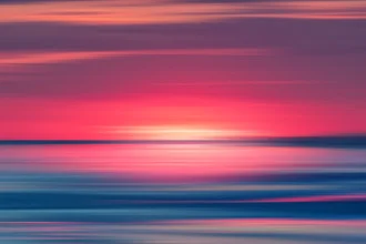Abstract photo art with soft colors of a sunset over the sea