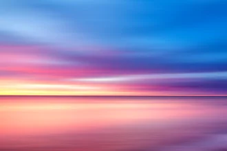 Abstract photo art with soft colors depicting a calm sunset over the sea.