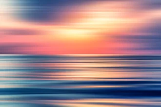 Abstract photo art featuring soft colors and dynamic movements in the water.