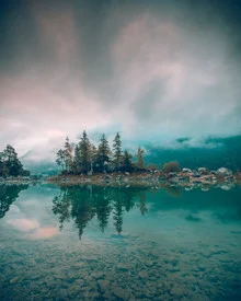 Beautiful island at Eib lake, featuring gentle waves and a calm morning atmosphere.