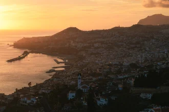 Photo art by Jean Claude Castor: Funchal in Madeira at sunset