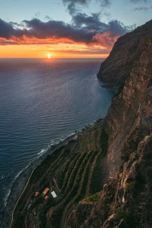 Photo art by Jean Claude Castor: Sunset over the coast of Madeira.