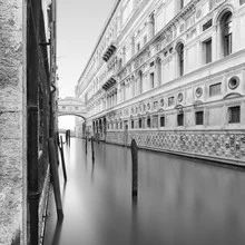 Black and white photo art by Ronny Behnert: Bridge of Sighs in Venice with water reflection