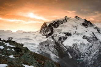 Photo art by Peter Wey: Monte Rosa bathed in the soft light of sunrise.