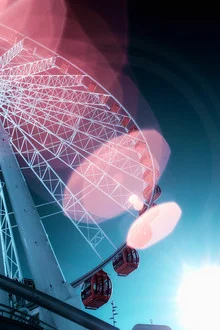 Photo art by Darius Ortmann: Surreal view of a Ferris wheel at a funfair