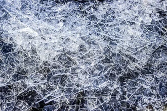Photo art by Malte Scherf: abstract ice landscape with soft, cool colors.