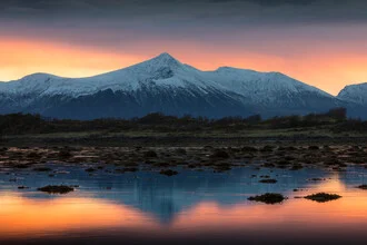 Sunrise over Norway: soft colors and calm symmetry