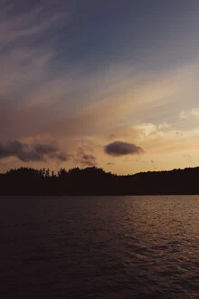 Photo art by Stephanie Hagenstein: sunset over Swedish lake with red sky