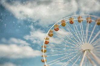 Photo art by Andrea Hansen: Ferris wheel with gondolas under a sunny sky