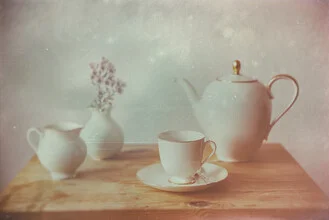 Photo art by Andrea Hansen: vintage teatime scene with a teapot and dishes