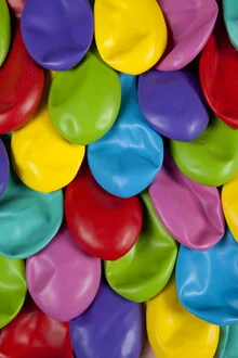 Photo art by Loulou von Glup: playful rainbow fish scales with a balloon.