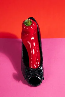 Photo art by Loulou von Glup: red shoe with pepper in a playful arrangement