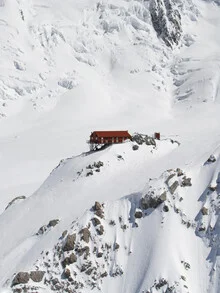 Calm mountain hut in the snow, surrounded by tall Alps, by Frida Berg.