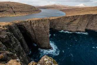Photo art by Fabian Wanisch: cliffs and lake in the Faroe Islands under calm mood.