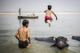 Photo art by Andreas Adams: jump into the Ganges, authentic moment in India