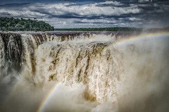 Photo art by Andreas Adams: waterfall in Argentina with a rainbow