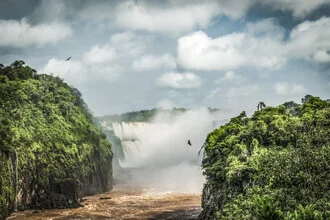 Photo art by Andreas Adams: tranquil landscape featuring a waterfall and lush jungle.