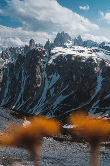Photo art by Christian Becker: snow-covered Dolomites under a clear sky.