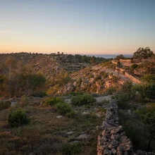 Fotokunst von Dennis Wehrmann: warmer Sonnenuntergang über Ibiza