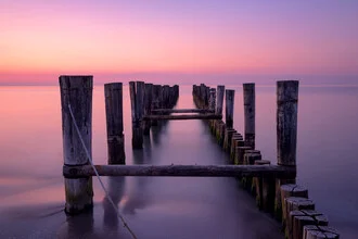 Photo art by Dave Derbis: serene evening mood at the jetty under a pink sky