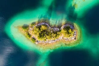 Aerial view of Eibsee in Bavaria, gentle waves and surrounding nature.