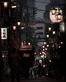Photo art by K3lvin Ch: softly glowing lantern in a dark setting