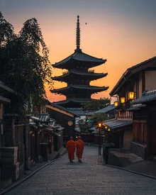 Photo art by Dimitri Luft: Monks at blue hour in front of a pagoda in Kyoto.