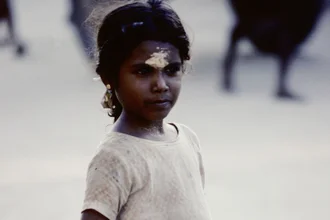 Photo art by Michael Schöppner: a smiling girl from Rameshwaram in India.