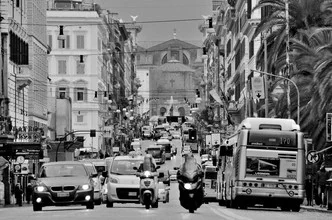 Wall art by Michael Schaidler: lively city life in Rome with traffic and buildings.