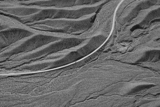 Photo art by Kristina Maria Rainer: solitary road through the Nevada desert