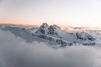 Photo art by Lina Jakobi: serene winter landscape with Swiss mountains and clouds