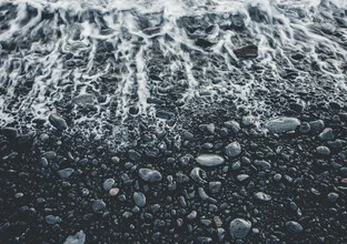 Photo art by Pascal Genzel: waves meeting lava on Lanzarote's black beach.