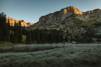 Sunrise over Sackwiesensee in the Austrian Alps.